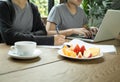 Business people team work with laptop with fresh fruit