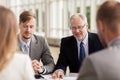 Smiling business people meeting in office Royalty Free Stock Photo