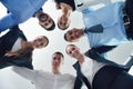 Business people with their heads together Royalty Free Stock Photo