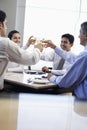 Business People Toasting Wineglasses In Restaurant