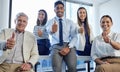 Business people, together and thumbs up in office portrait for agreement, motivation or diversity. Men, women and Royalty Free Stock Photo