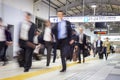 Business people traveling by Tokyo metro.