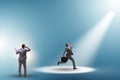 Business people under the spotlight Royalty Free Stock Photo