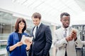 Business people using digital tablet on meeting