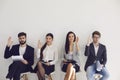 Business people waiting for job interview recruitment sitting on a chair in the office. Royalty Free Stock Photo