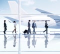 Business People Walking in the Airport Royalty Free Stock Photo