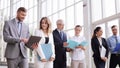 Business people walking along office building 13