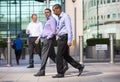 Business people walking on the Canary Wharf square. London, UK Royalty Free Stock Photo