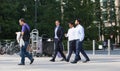 Business people walking on the Canary Wharf square. London, UK Royalty Free Stock Photo