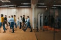 Business people walking at modern open space. Motion blur. Concept