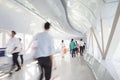 Business people walking in the office corridor. Royalty Free Stock Photo