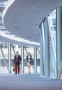 Business people walking together in the corridor at modern office building Royalty Free Stock Photo