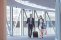 Business people walking together in the corridor at modern office building Royalty Free Stock Photo