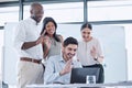 Business people wave, laptop video call and online meeting presentation in company office. Diversity staff group talking Royalty Free Stock Photo