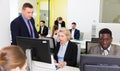 Business people working in open plan office Royalty Free Stock Photo