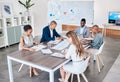 Business people working on documents and laptop at a office boardroom table. Group of professional, diversity and Royalty Free Stock Photo