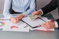 Business people working with financial documents at office. Royalty Free Stock Photo