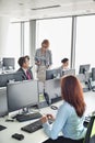 Business people working in an open plan office Royalty Free Stock Photo