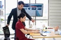 Business people working together with laptop computers on the desk in meeting room, businesswoman and businessman checking Royalty Free Stock Photo