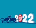 A business person aiming at number 2022. The goal of year