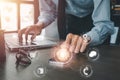 Business person hand using fingerprint indentification to access personal financial data