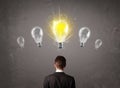 Business person having an idea light bulb concept Royalty Free Stock Photo
