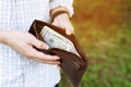 Business Person holding an empty wallet in the hands Royalty Free Stock Photo