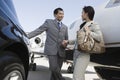 Business Person Holding Hands At Airfield Royalty Free Stock Photo