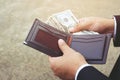 Business Person holding an wallet in the hands of an man no money Royalty Free Stock Photo