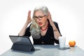 Business person panicked and having an anxiety attack, stressed at work on computer for possible taxes deadline or identity theft Royalty Free Stock Photo