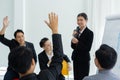 Business person showing hand up for presentation in meeting room seminar training. question meeting concept Royalty Free Stock Photo