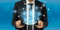 Professional business person in a suit using a digital tablet with interactive technology icons representing Royalty Free Stock Photo