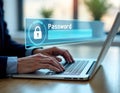 Business person types password on laptop in office. Security code appears on screen. Tech person using computer in work