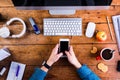 Business person working at office desk wearing smart watch Royalty Free Stock Photo