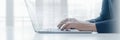 Business person works on laptop managing online documents. Efficient work processes shown on screen. Person uses computer for Royalty Free Stock Photo