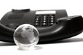 Business phone and glass globe Royalty Free Stock Photo