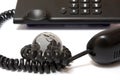 Business phone and glass globe Royalty Free Stock Photo