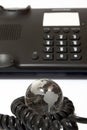 Business phone and glass globe Royalty Free Stock Photo