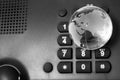 Business phone and glass globe Royalty Free Stock Photo