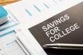 Business photo shows hand written text savings for college