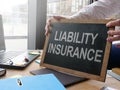 Business photo shows printed text liability isurance