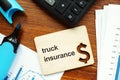 Business photo shows printed text truck insurance