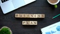 Business plan phrase made of wooden cubes, company strategy for near future