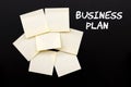 Business Plan text with yellow stocky notes