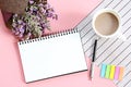 Top view or flat lay of open notebook paper, bouquet of dried wild flowers and coffee cup on desk table Royalty Free Stock Photo