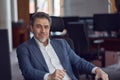 Business portrait - Businessman sitting at desk in office. Royalty Free Stock Photo