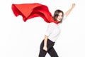 Business, power, success, achievement and people concept. Young smiling businesswoman in red superhero cape holding raised fists