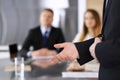 Business presentation. Businessman giving speech to colleagues and partners at corporate meeting or conference, close-up Royalty Free Stock Photo