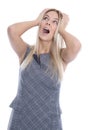 Business pressure: isolated frustrated pretty young woman is touching her head. Royalty Free Stock Photo