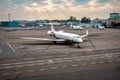 Business private jet airplane parked at outside and waiting vip persons. Luxury tourism and business travel Royalty Free Stock Photo